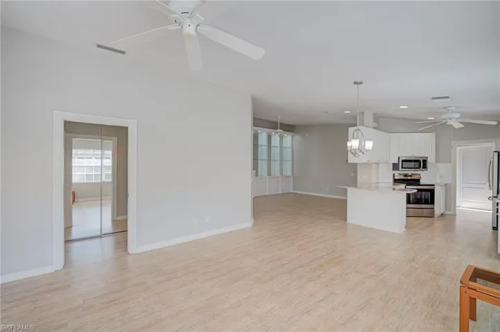 Looking into kitchen and towards Primary BR entry