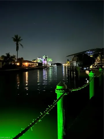View of water feature featuring a boat dock - Virtually Edited Image