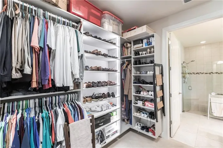 Spacious closet with tile patterned floors