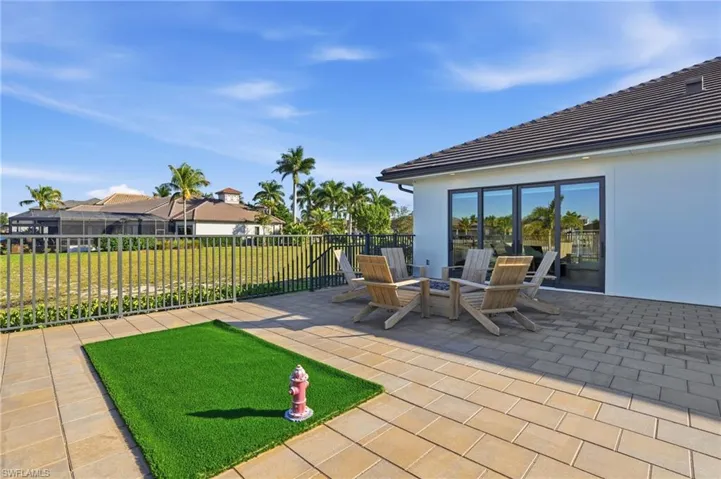 View of patio / terrace featuring an outdoor fire pit