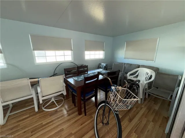 Dining space featuring wood finished floors
