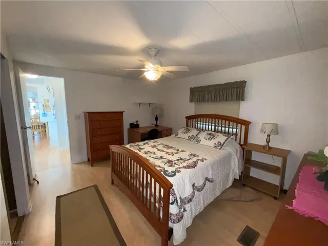 Bedroom featuring light wood finished floors and ceiling fan