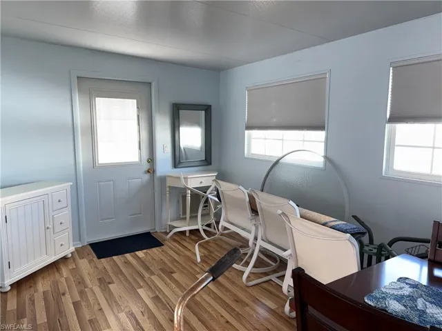 Office space with light wood-style flooring