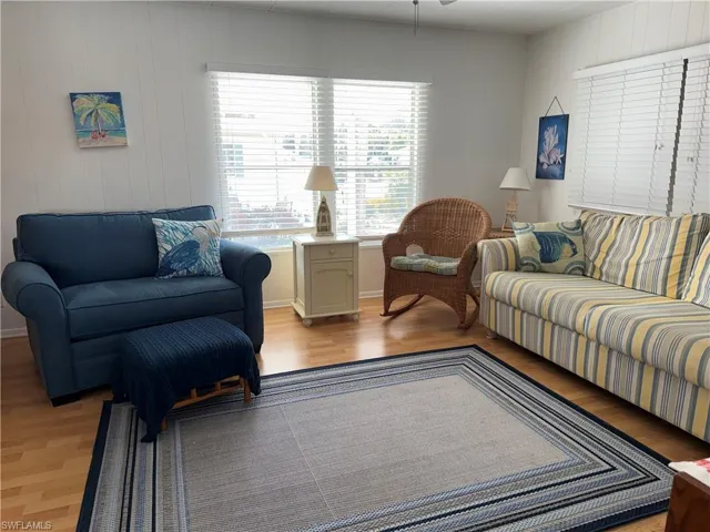 Living area with light wood-style flooring