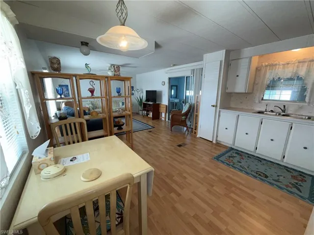 Dining space with light wood-type flooring