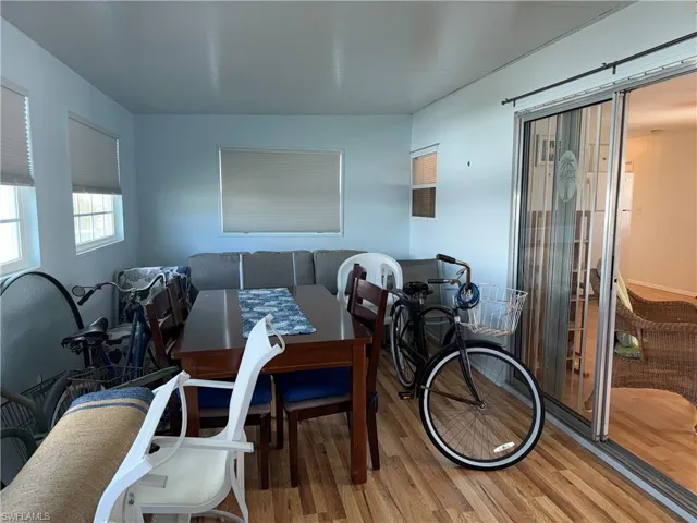 Dining area featuring wood finished floors