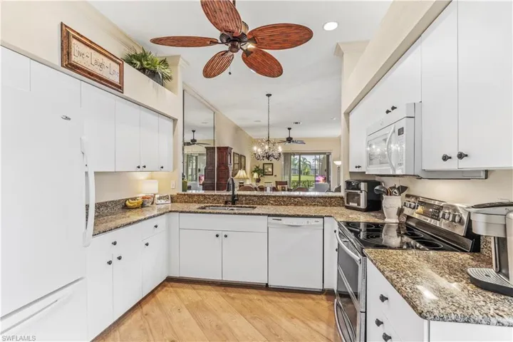 Kitchen with Beautiful Granite Countertops with Views of the Golf Course