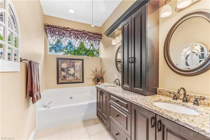 Beautifully updated Primary Bathroom with Separate Soaking Tub, Shower and Dual Sinks