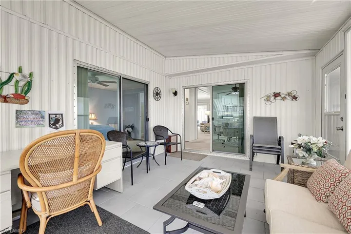 Sunroom with an outdoor living space