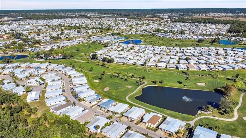 Aerial view of residential area with a large body of water