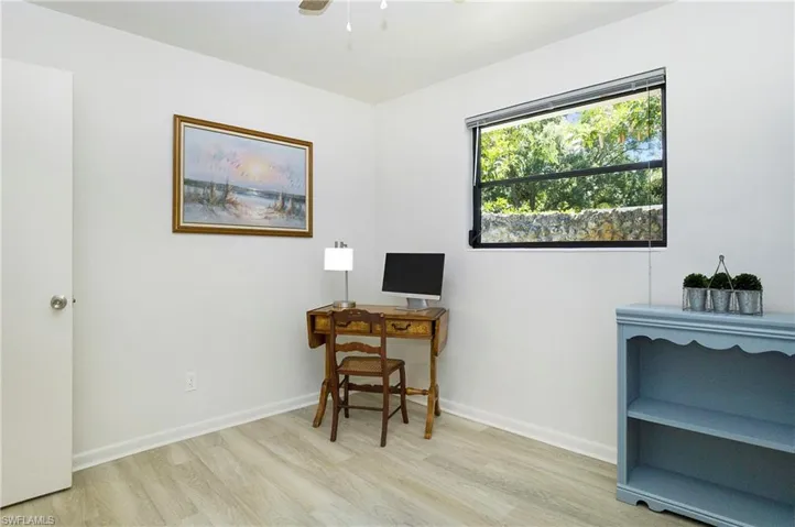 featuring ceiling fan and light luxury vinyl wood-style floors
