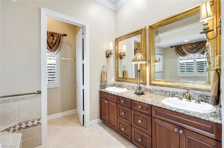 Full bath featuring ensuite bathroom, a jetted tub, a shower stall, tile patterned floors, and recessed lighting