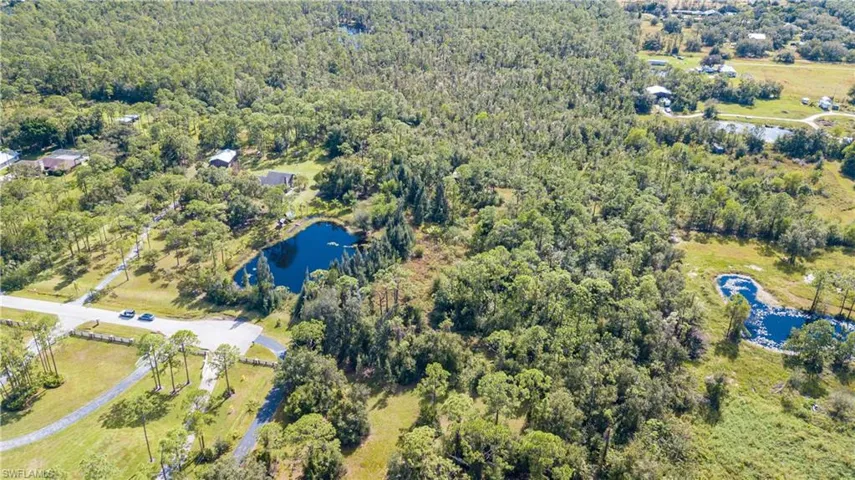 Aerial View Of 11540 Fox Hill Rd. The Adjacent 5 Acre Tract With Home And Outbuildings, Is Located In The Center Of The Adjacent 5 Acre Parcel, Is Also AVAILABLE FOR SALE. These 2 Lovely Properties Meet In The Middle With A .75/Acre Private Lake.