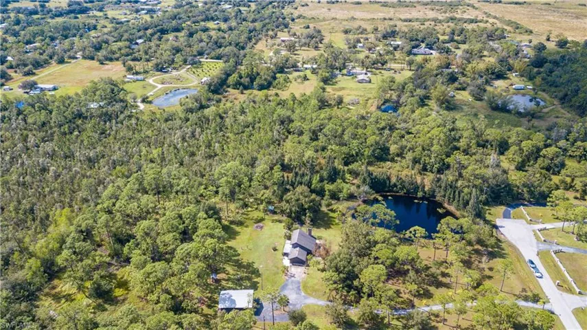 Aerial View Of 11540 Fox Hill Rd. The Adjacent 5 Acre Tract With Home And Outbuildings, Is Located In The Center Of The Adjacent 5 Acre Parcel In The Foreground, Is Also AVAILABLE FOR SALE. These 2 Lovely Properties Meet In The Middle With A .75/Acre Private Lake.