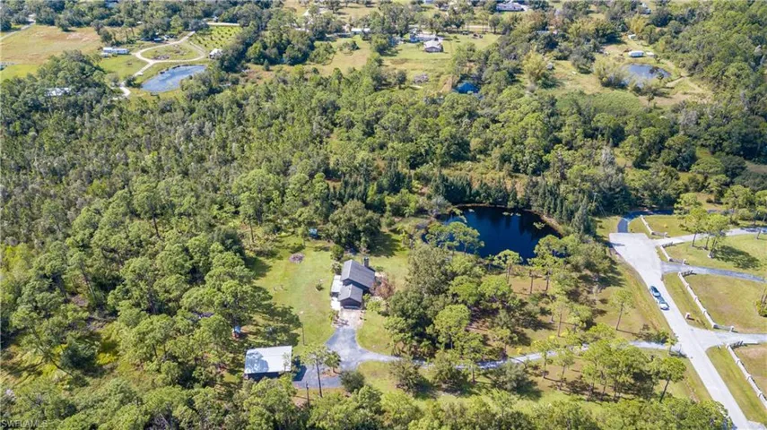 Aerial View Of 11540 Fox Hill Rd. The Adjacent 5 Acre Tract With Home And Outbuildings, Is Located In The Center Of The Adjacent 5 Acre Parcel In The Foreground, Is Also AVAILABLE FOR SALE. These 2 Lovely Properties Meet In The Middle With A .75/Acre Private Lake.