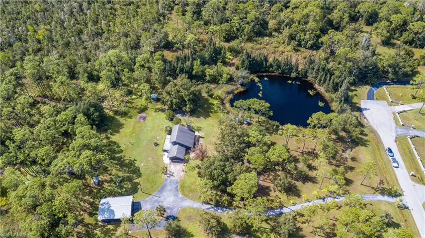 Aerial View Of 11540 Fox Hill Rd. The Adjacent 5 Acre Tract With Home And Outbuildings, Is Located In The Center Of The Adjacent 5 Acre Parcel In The Foreground, Is Also AVAILABLE FOR SALE. These 2 Lovely Properties Meet In The Middle With A .75/Acre Private Lake.