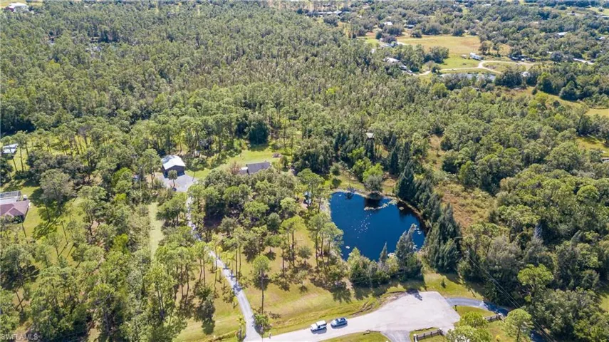 Aerial View Of 11540 Fox Hill Rd. The Adjacent 5 Acre Tract With Home And Outbuildings, Is Located In The Center Of The Adjacent 5 Acre Parcel In The Foreground, Is Also AVAILABLE FOR SALE. These 2 Lovely Properties Meet In The Middle With A .75/Acre Private Lake.