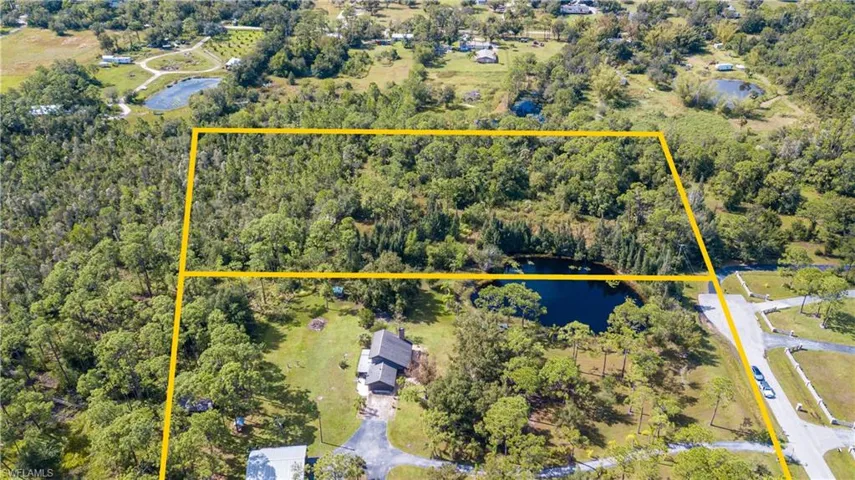 Aerial View Of 11540 Fox Hill Rd. The Adjacent 5 Acre Tract With Home And Outbuildings, Is Located In The Center Of The Adjacent 5 Acre Parcel In The Foreground, Is Also AVAILABLE FOR SALE. These 2 Lovely Properties Meet In The Middle With A .75/Acre Private Lake.