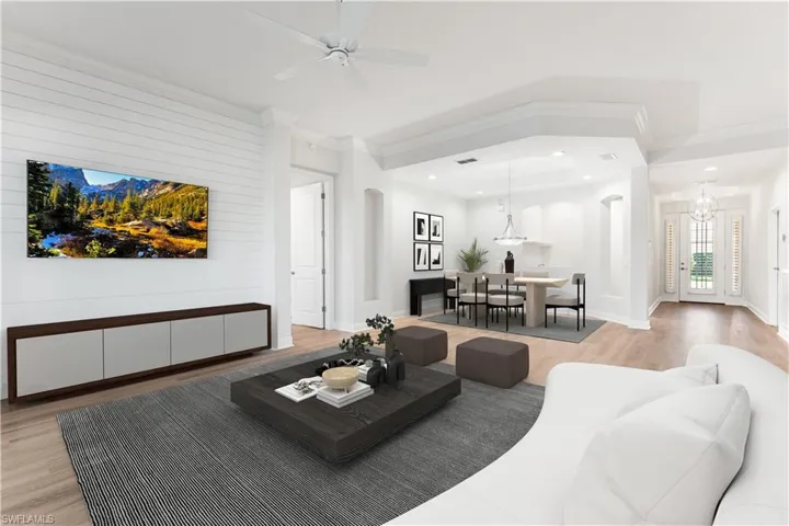 This area has been digitally staged. So many nice features to notice throughout the home! Niches. custom lighting! (The shiplap wall is actually in the condo.  That was not digitally staged.)