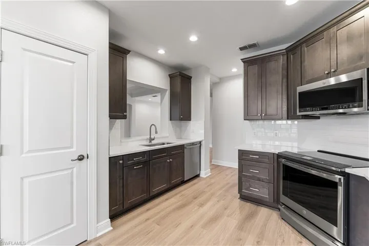 Your kitchen offers a nice pantry as well. Pass thru window into living area is a bonus for entertaining!