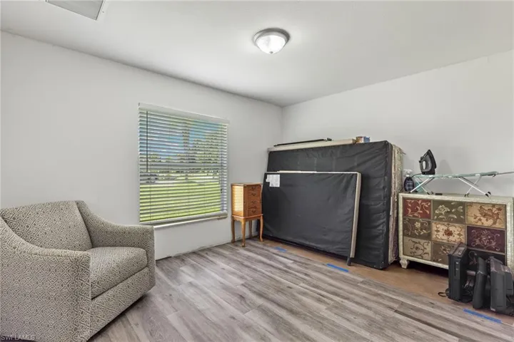 Living area featuring hardwood / wood-style flooring