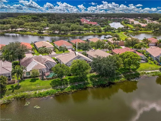 Aerial view of residential area with a large body of water