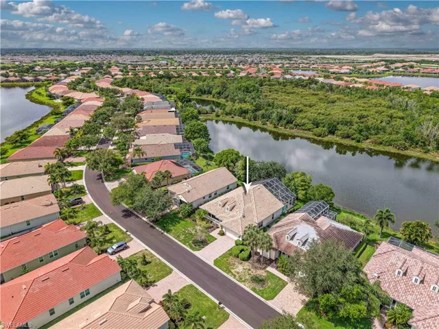 Aerial view of residential area with a large body of water