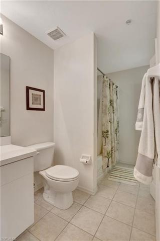 Laundry is hidden is this guest bathroom, to the right (across from tub/shower)