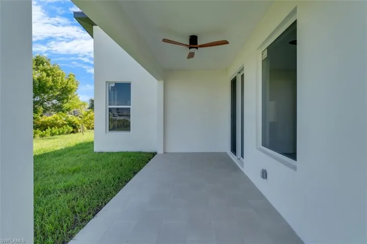 View of patio with ceiling fan