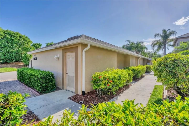 View of property exterior with stucco siding