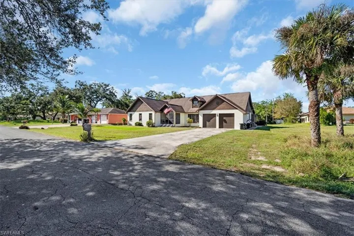 View of front of property with a front yard
