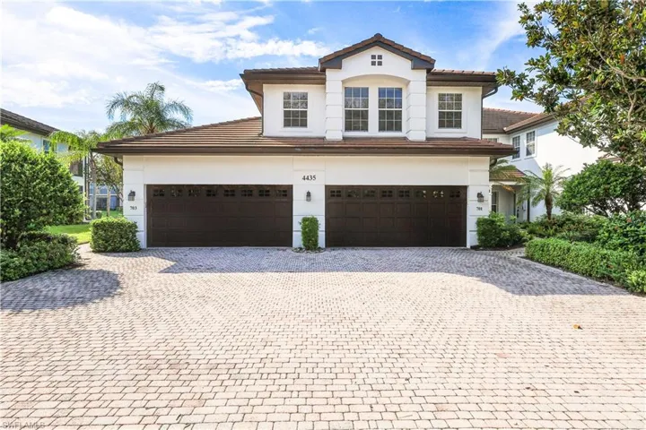 Mediterranean / spanish house with a garage