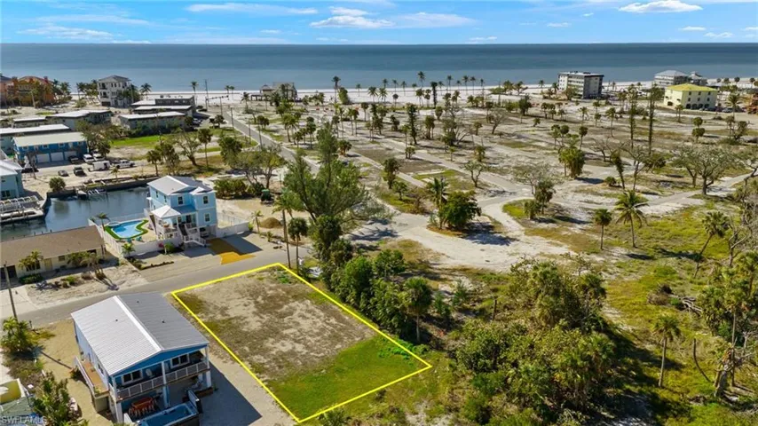 Birds eye view of property with a water view VIRTUALLY EDITED