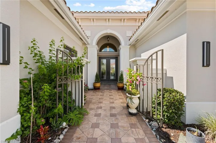Entrance to property featuring french doors