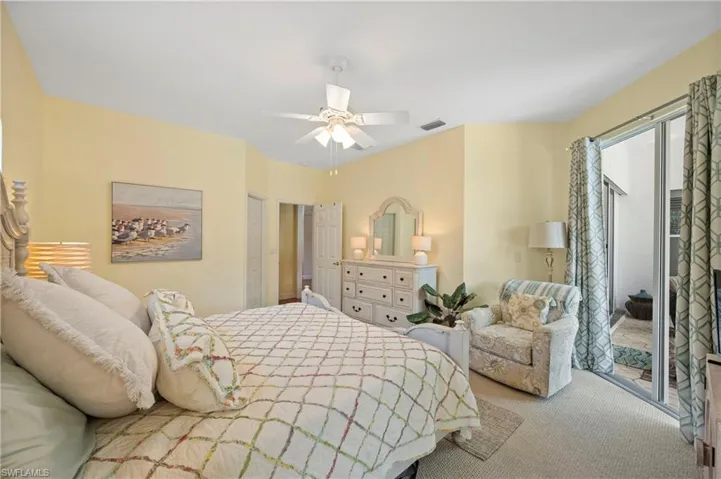 Bedroom featuring carpet floors and a ceiling fan