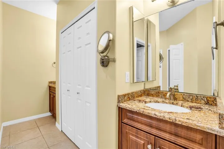 Master Bathroom with 2 separate vanities and linen closet