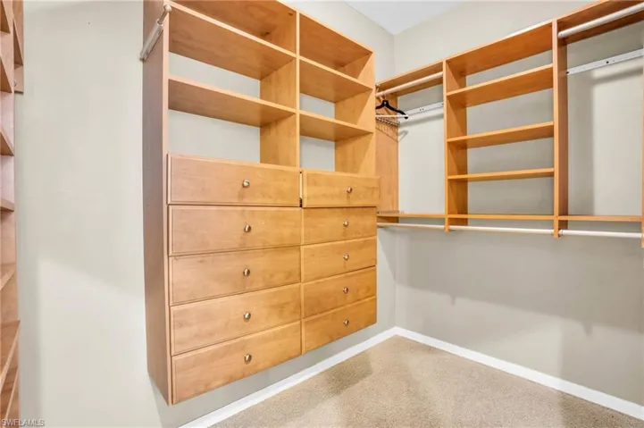 Walk in closet with custom built-ins