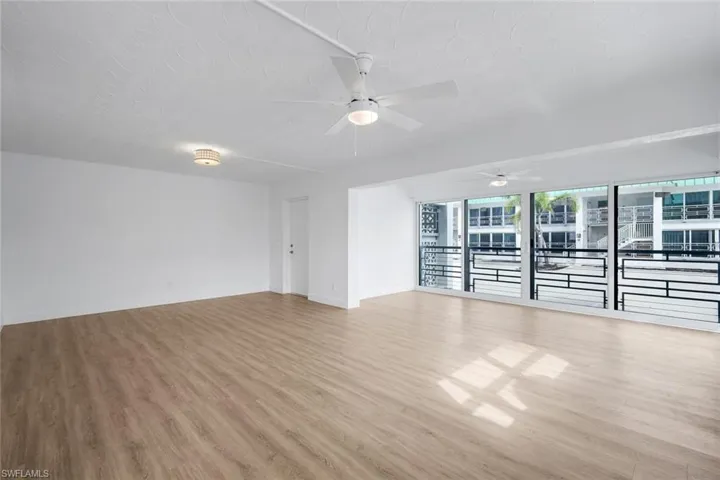 View of living and dining area from kitchen.