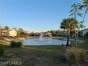 Water view featuring nearby suburban area