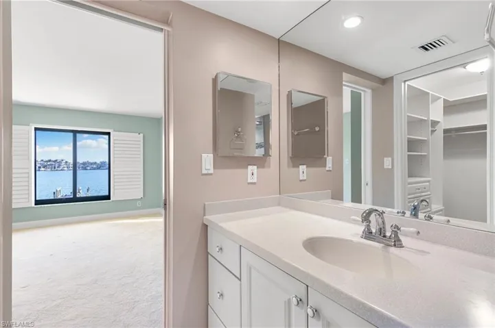 Guest bath and Updated  Guest bedroom with water view