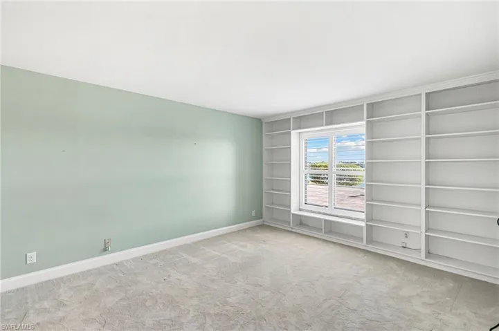 Guest Bedroom  with bay views and built in shelves