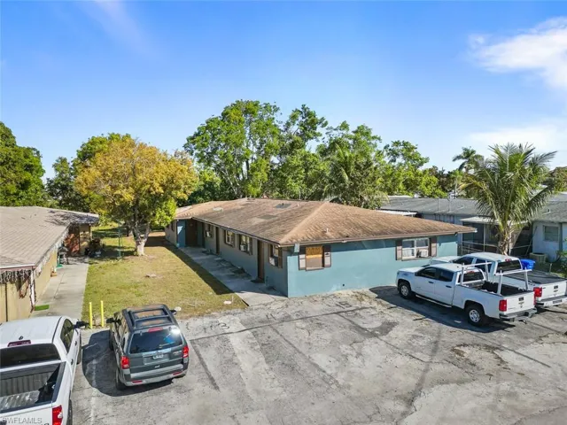 Single story home with a front yard