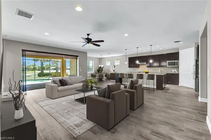 Great room, virtually staged.