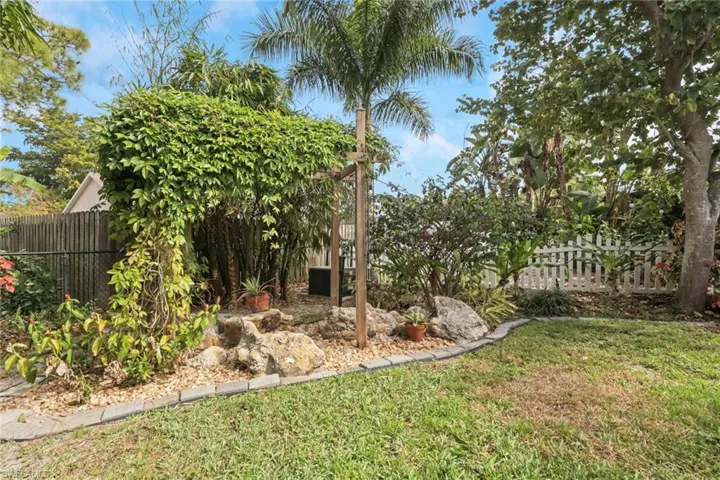 View of fenced backyard