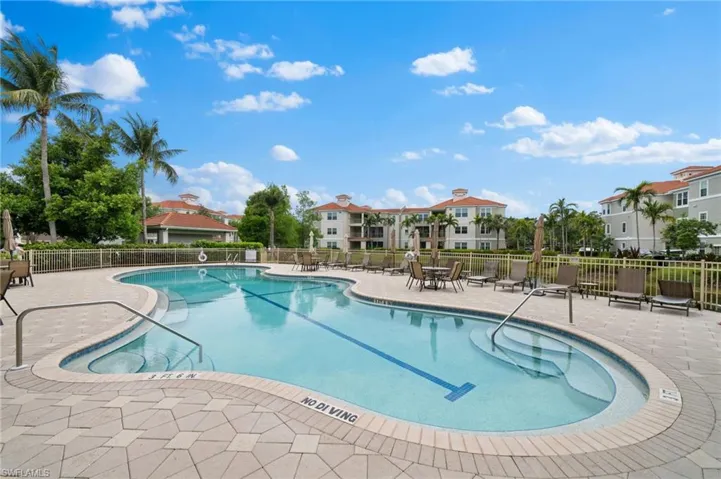 Community pool featuring a patio area