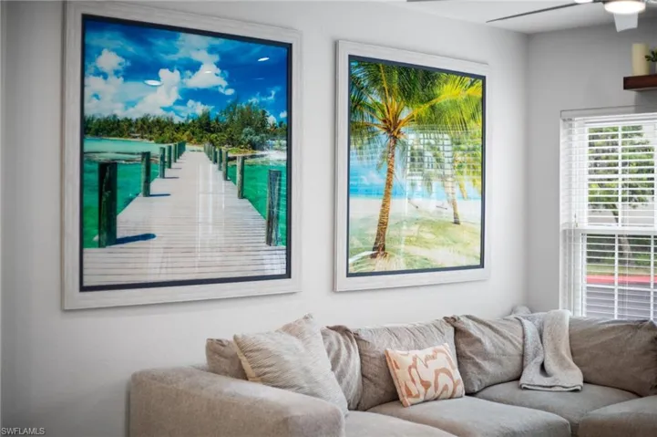 Living room featuring ceiling fan