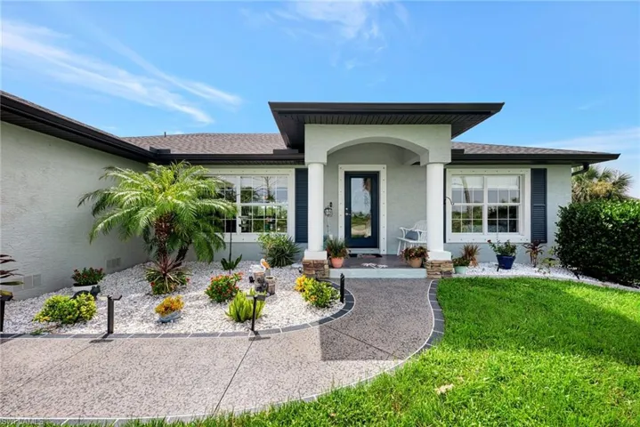 Property entrance with a yard