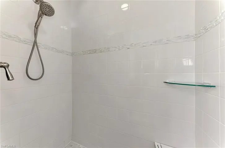 Bathroom with tiled shower