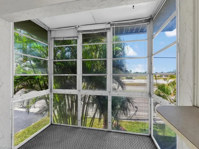Unfurnished sunroom with plenty of natural light