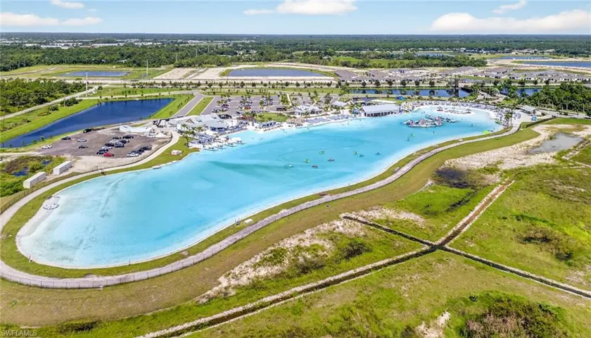 Aerial view of residential area with a nearby body of water